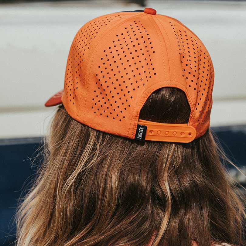 WILDER CO. ORANGE SNAPBACK HAT